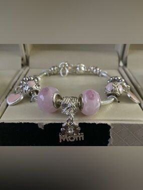 Multiple Charm Bracelets,w/MOM see pictures for exact details